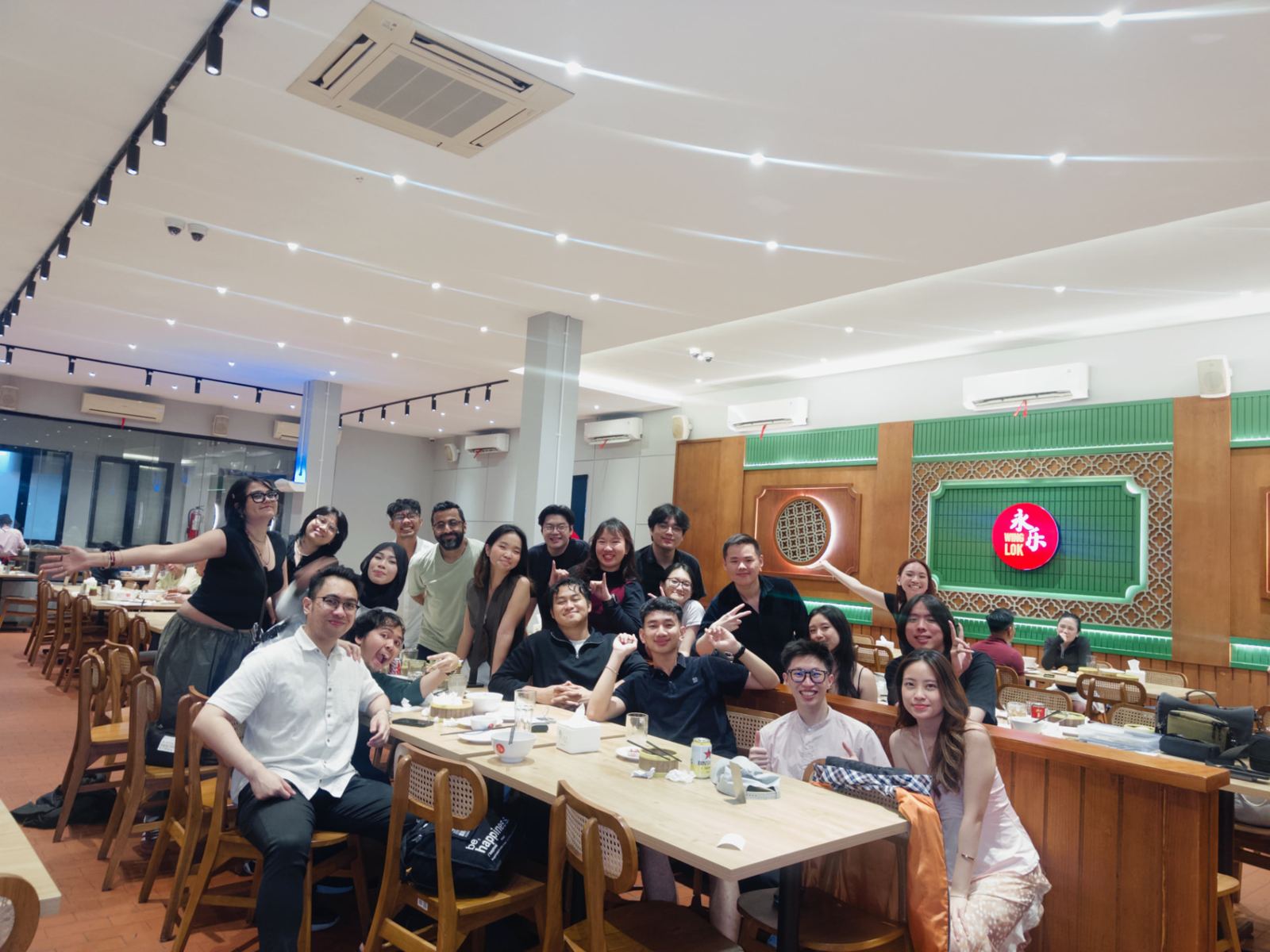Wide shot of the whole table at the end of dinner